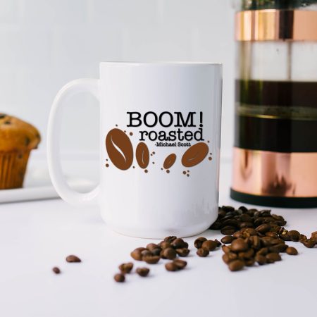 White coffee mug with SVG design of coffee beans and words Boom Roasted on it