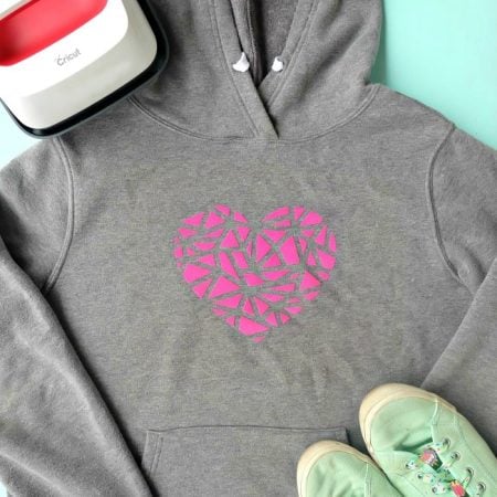 Gray hoodie with vinyl pink heart on it