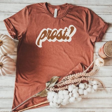 Copper colored t-shirt with the word Prost on it