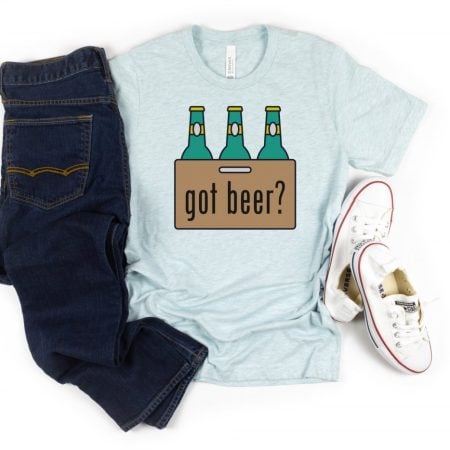 Light blue t-shirt with an image of a pack of beer and the saying Got Beer?