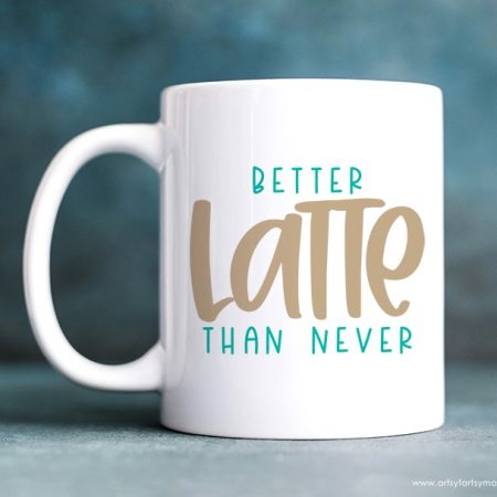 White coffee mug with the words Better Latte than Never