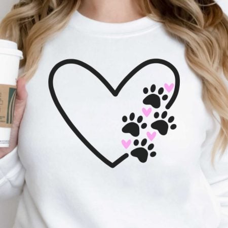 White shirt with a black outline of a heart with paws making up part of the design