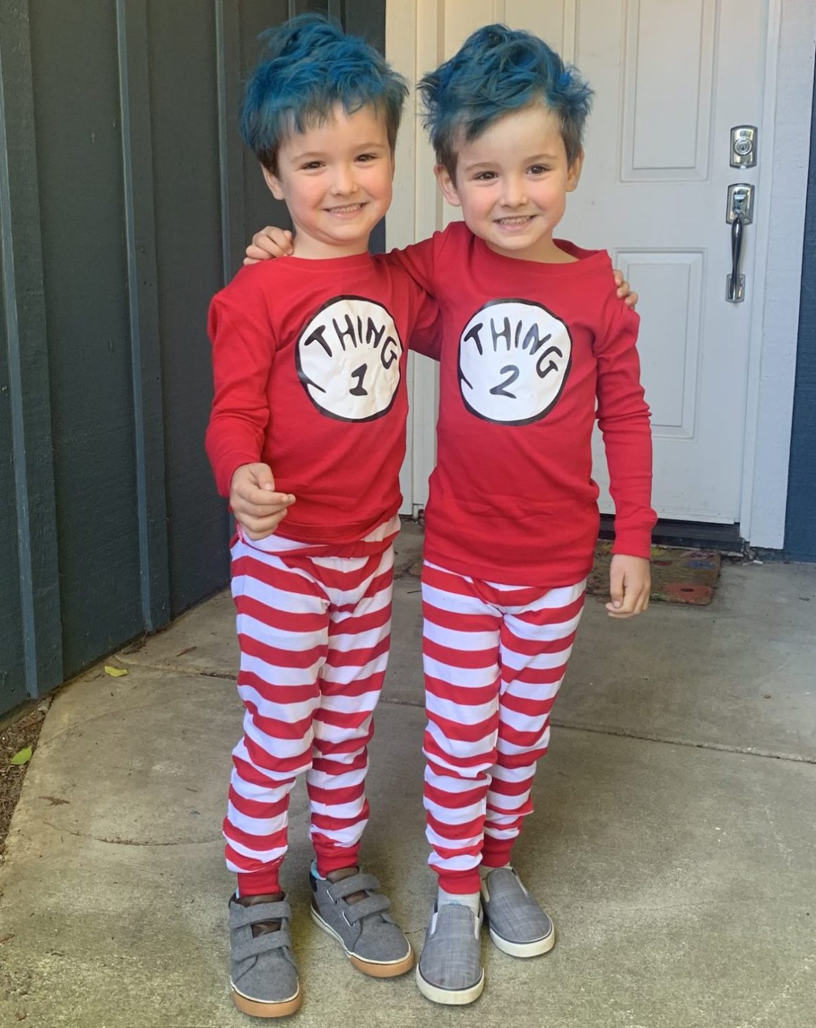 Twin 5-year-olds dressed as thing 1 and thing 2