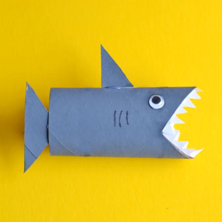 Blue shark made out of a toilet paper roll