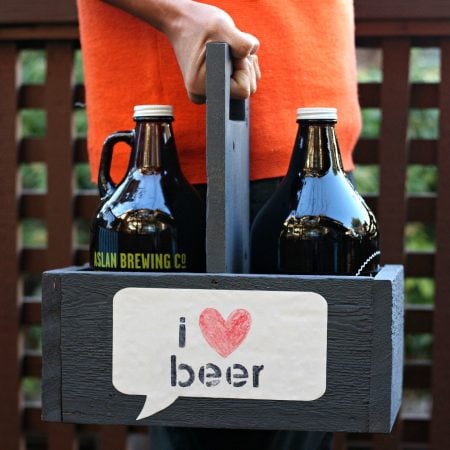 Growler Carrier out of upcycled wood with I 'heart' beer sign on it