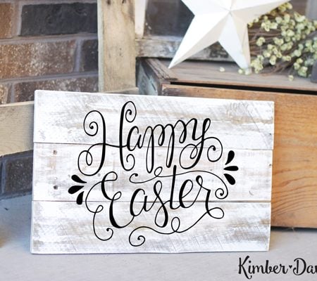 A weathered looking sign with the words Happy Easter on it