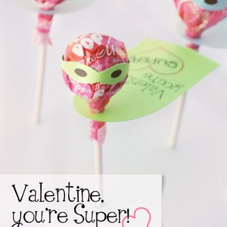 Tootsie pops decorated as super heroes for Valentine's Day