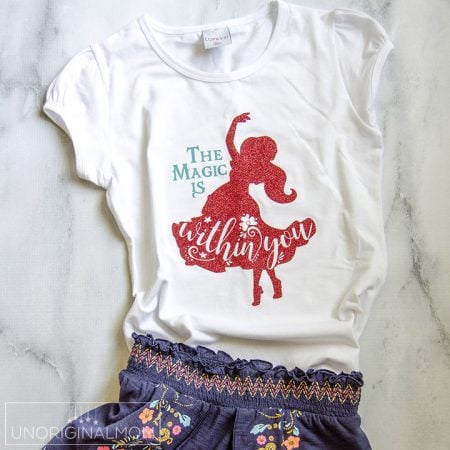 A white Elena of Avalor shirt with the saying The Magic is Within You