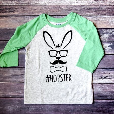 Boy's baseball style t-shirt with an image of a rabbit on it wearing glasses, mustache and bowtie and says #Hopster
