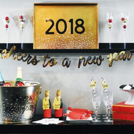 A bar decorated with NYE decor for the year 2018