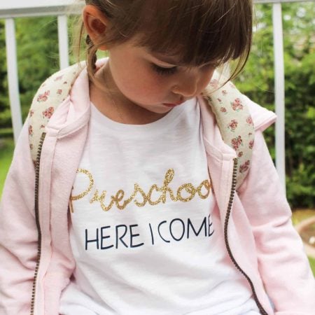 Little girl wearing a Preschool Here I Come t-shirt