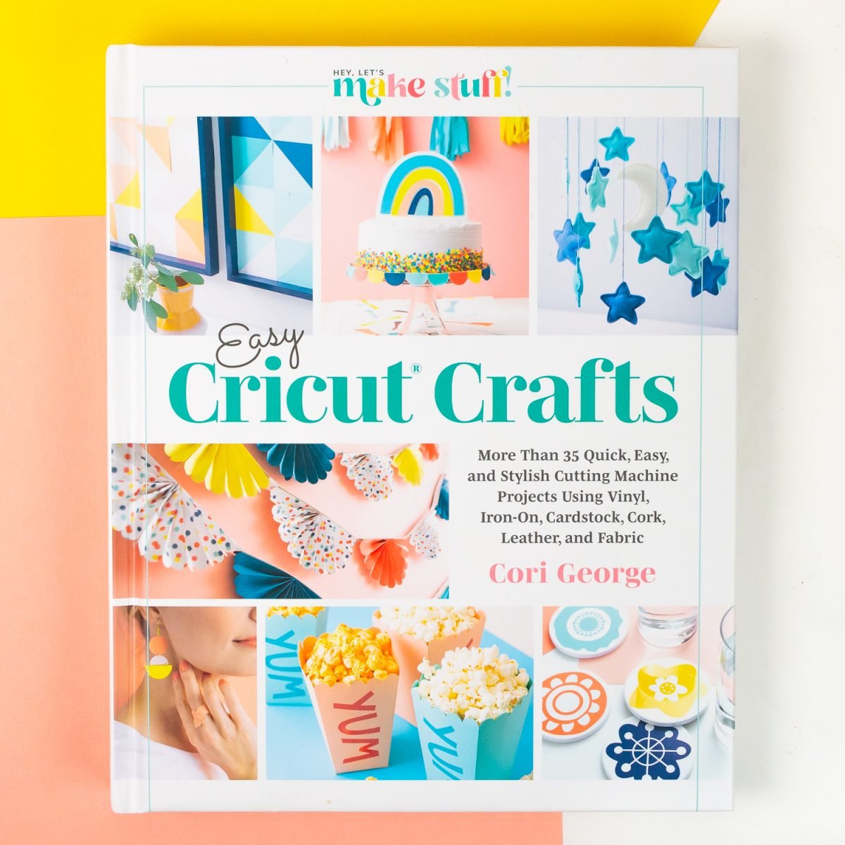Easy Cricut Crafts book on pink and yellow background.