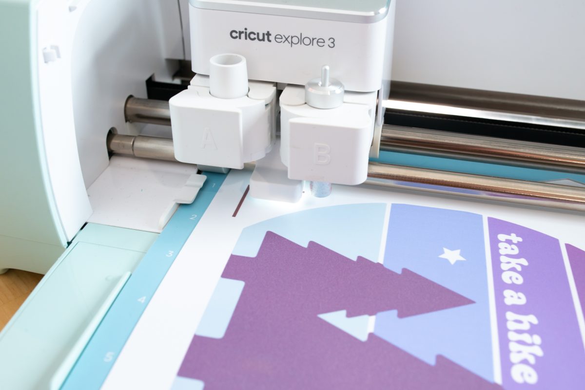 Cricut with light on showing how print then cut works.
