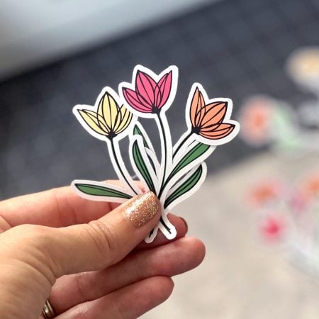 Woman holding a wildflowers sticker