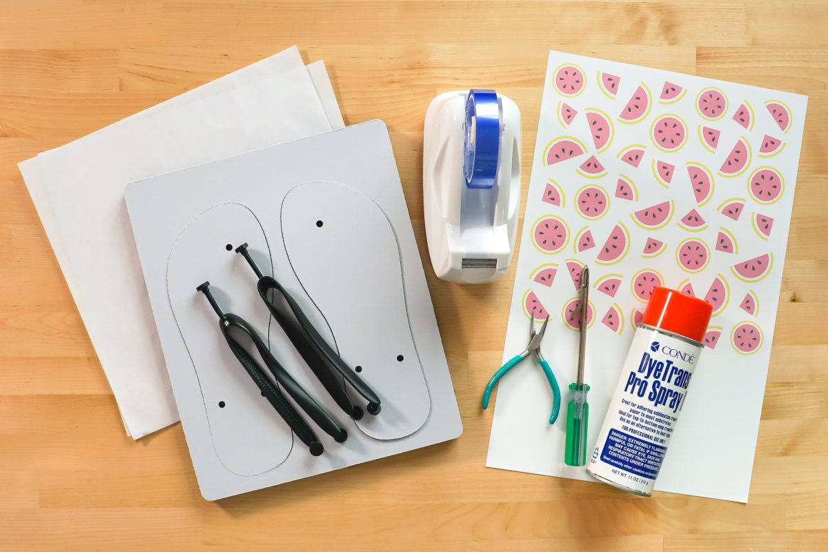 Supplies: flip flops, butcher paper, tape, spray glue, image, pliers, flip flop tool