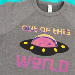 Gray Bella+Canvas sponge fleece sweatshirt with holographic "out of this world" image