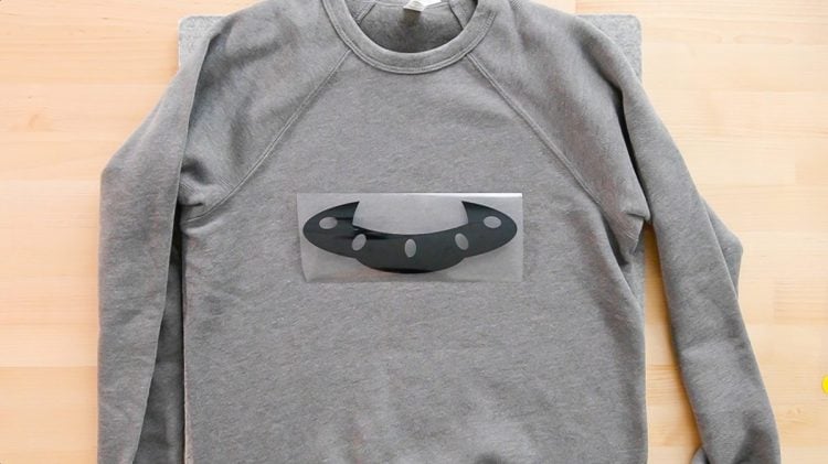 picture of design placed on gray sweatshirt