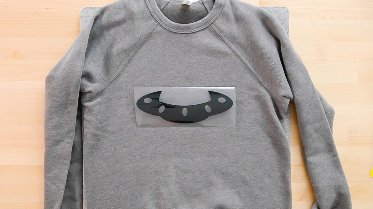 black layer of UFO SVG on gray BELLA+CANVAS sweatshirt