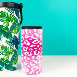 Final leaf and leopard sublimation tumblers on teal background