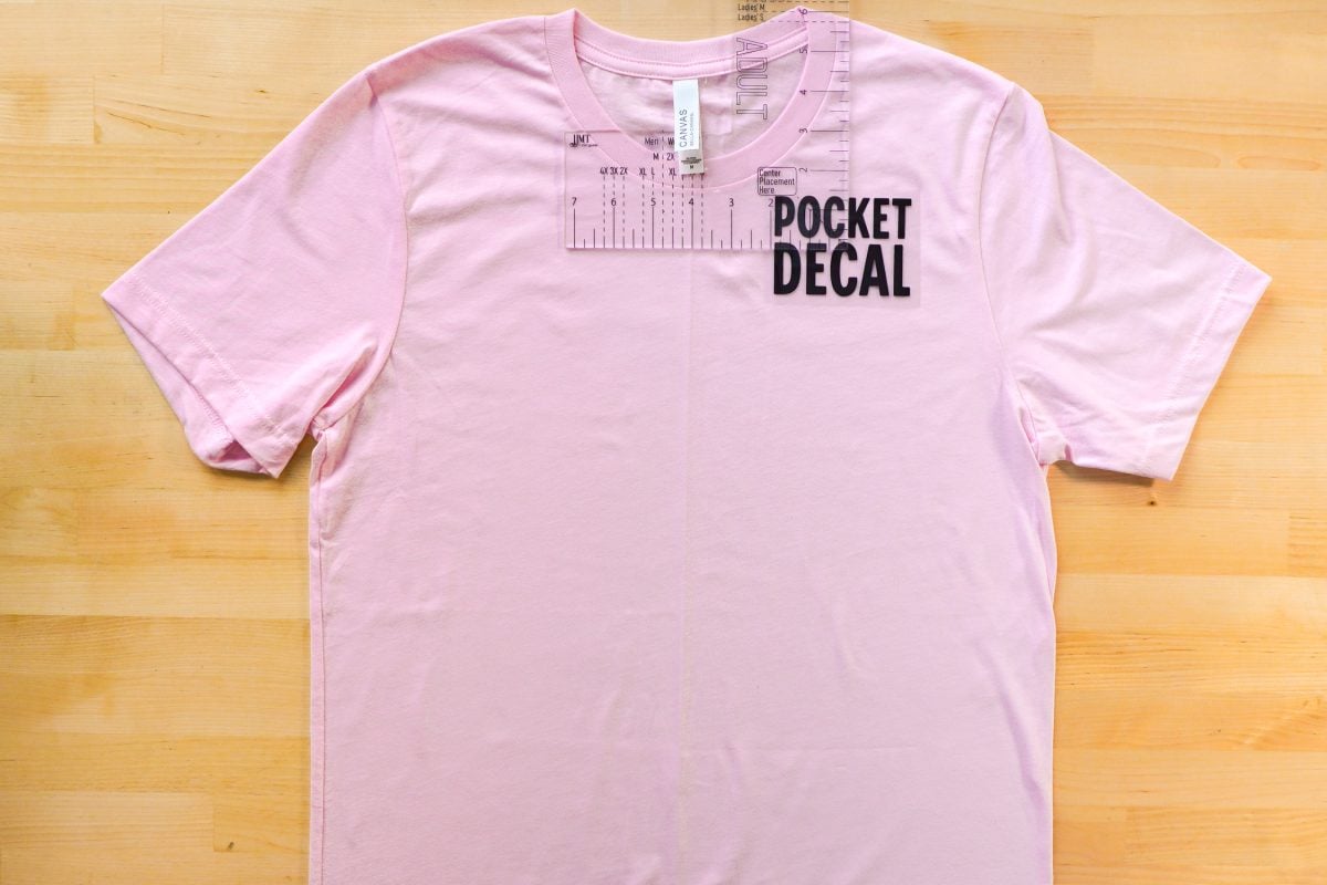 Pocket ruler on pink t-shirt