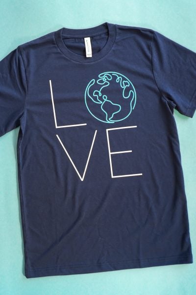 Final Earth LOVE shirt on teal background