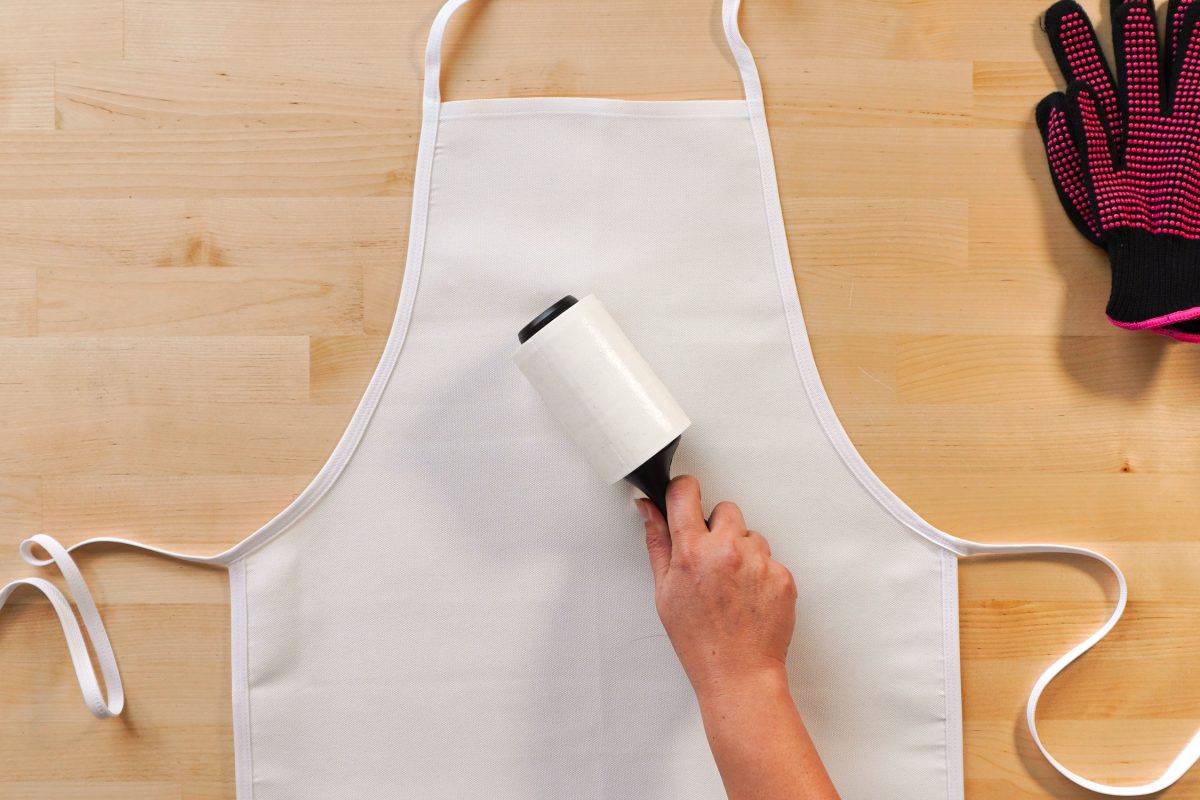 Hand lint rolling apron