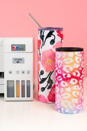 Sublimation printer surrounded by sublimation drinkware