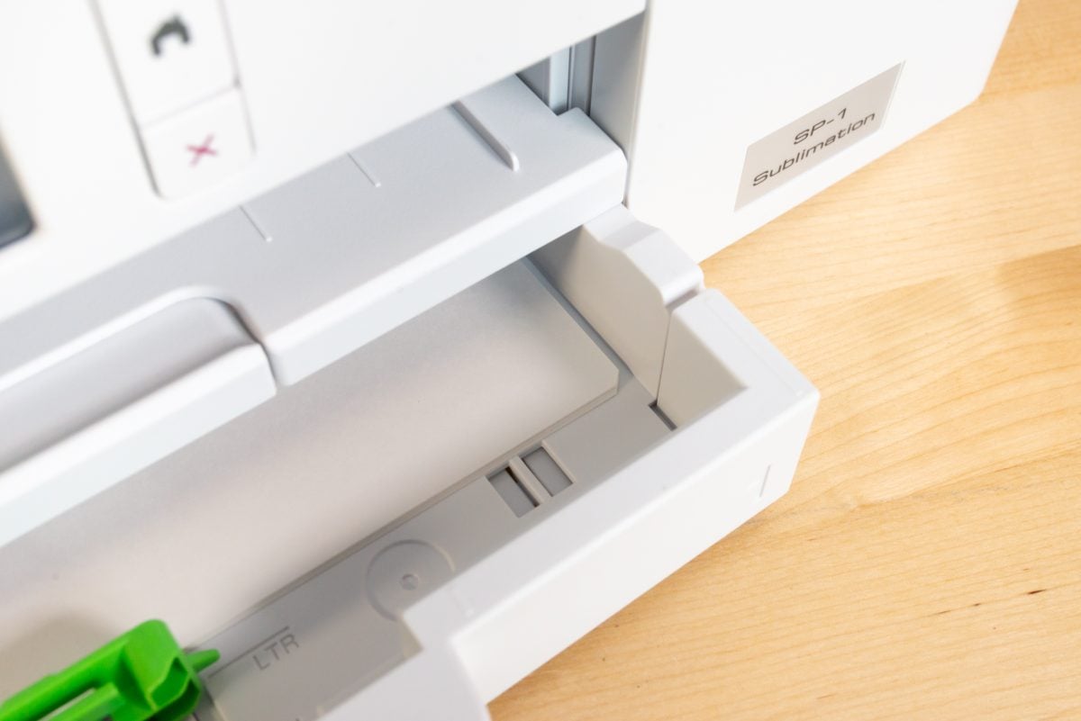 Printer with notched paper in drawer