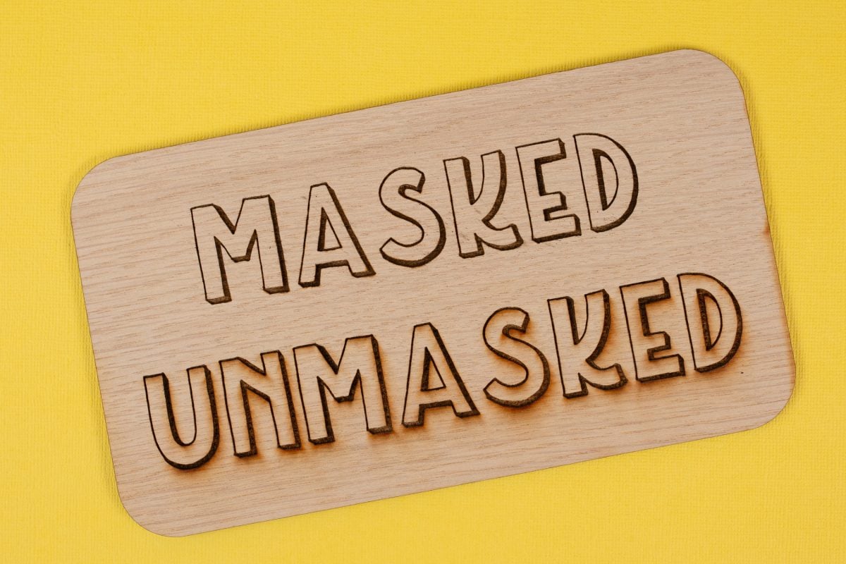 Project showing the word "unmasked" with charring and the word "masked" with no charring