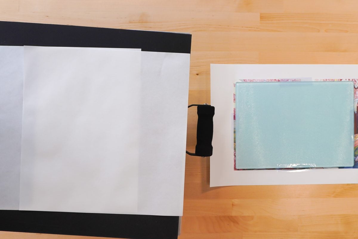 Two sheets of butcher paper in the press.