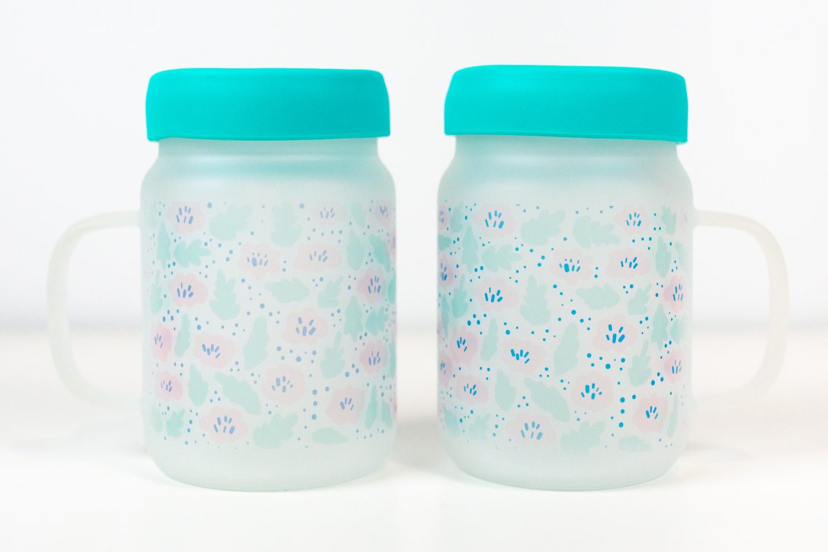Two mason jars with same print, right one is more vivid