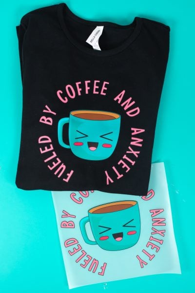 Coffee and Anxiety DTF Transfer on black shirt on teal background