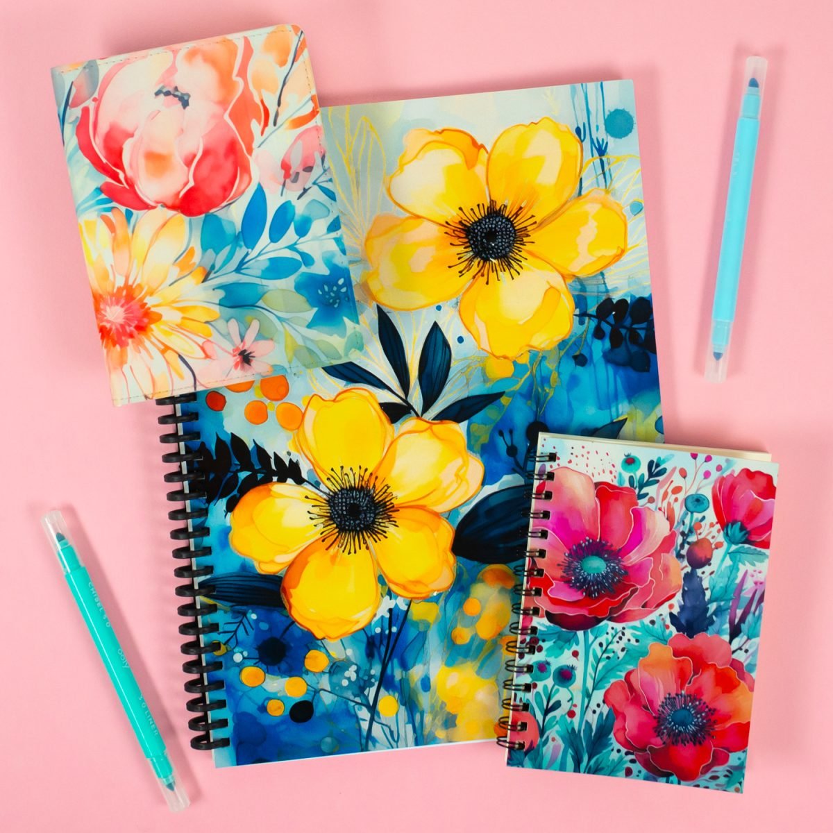 Three sublimation journals on a pink background
