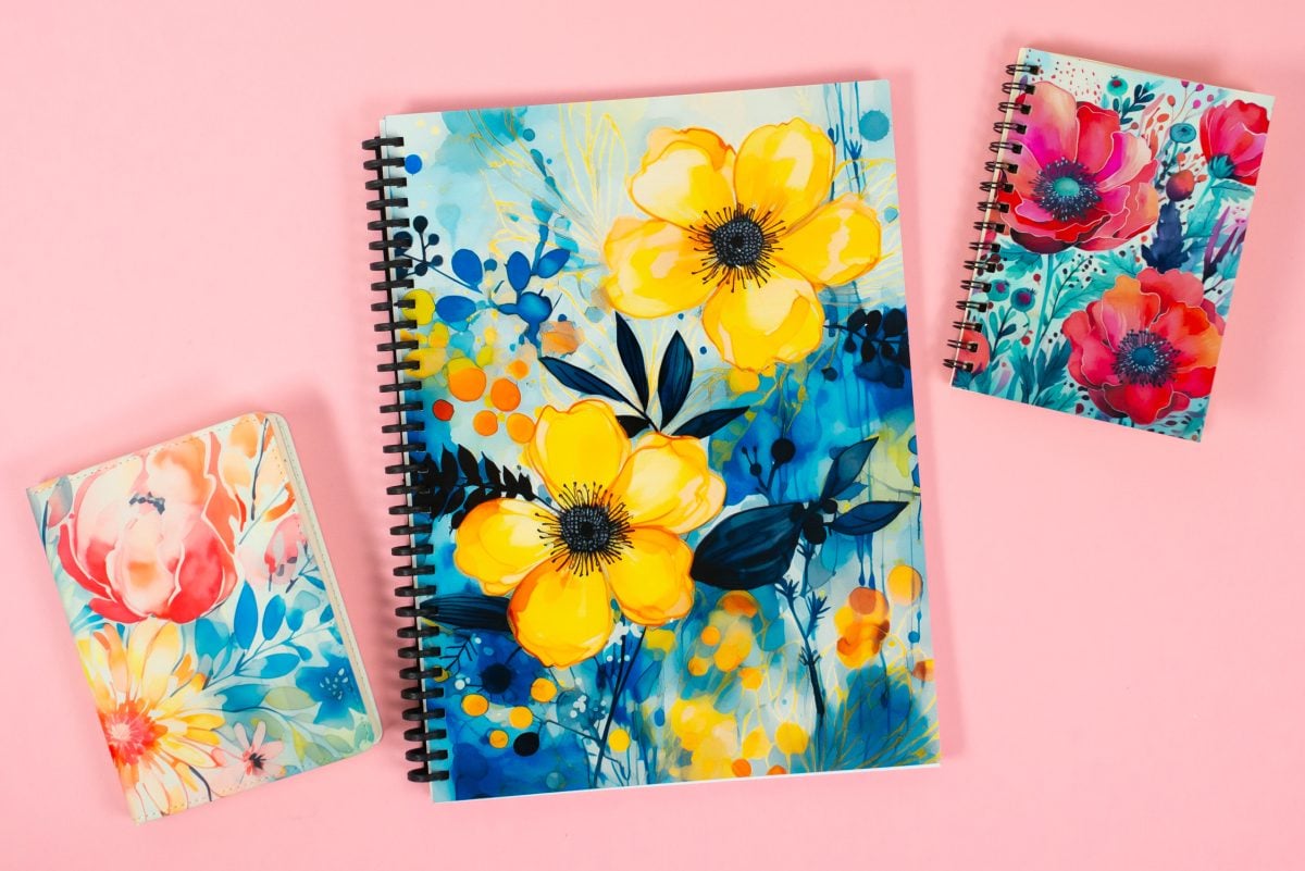 Three sublimation journals on a pink background