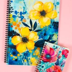 Two sublimation journals on a pink background