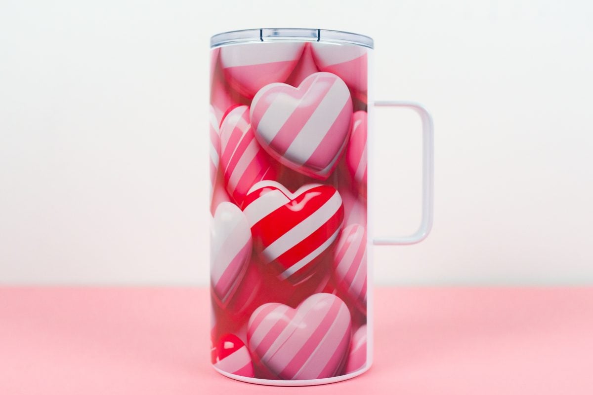 Travel mug with heart design