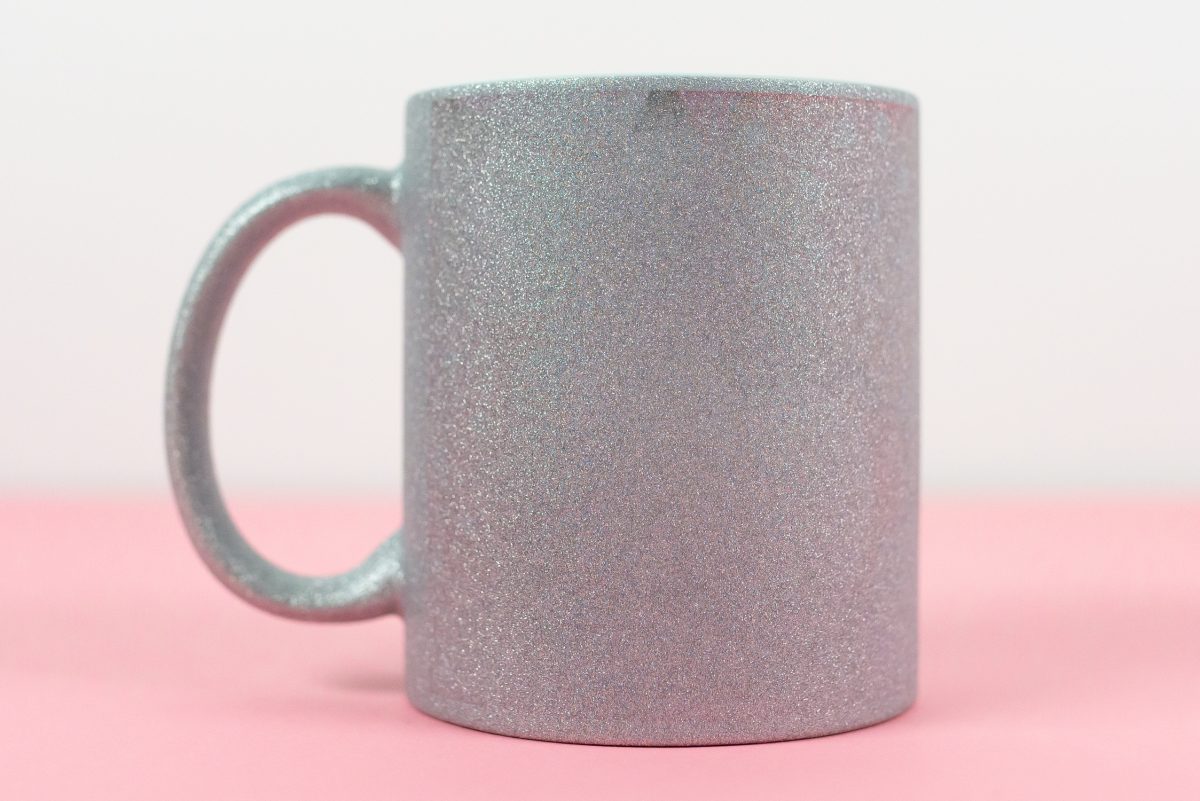Glitter mug with very faded heart design