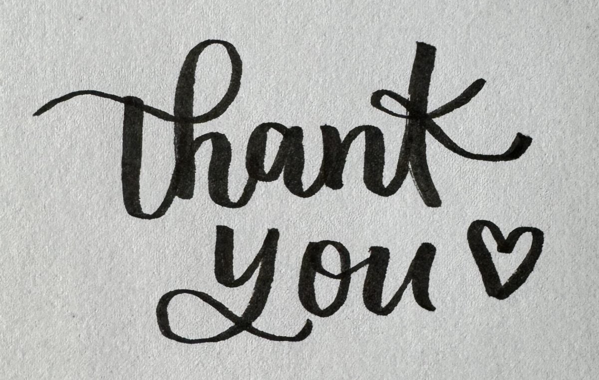 Hand-lettered "thank you" in a bold black pen