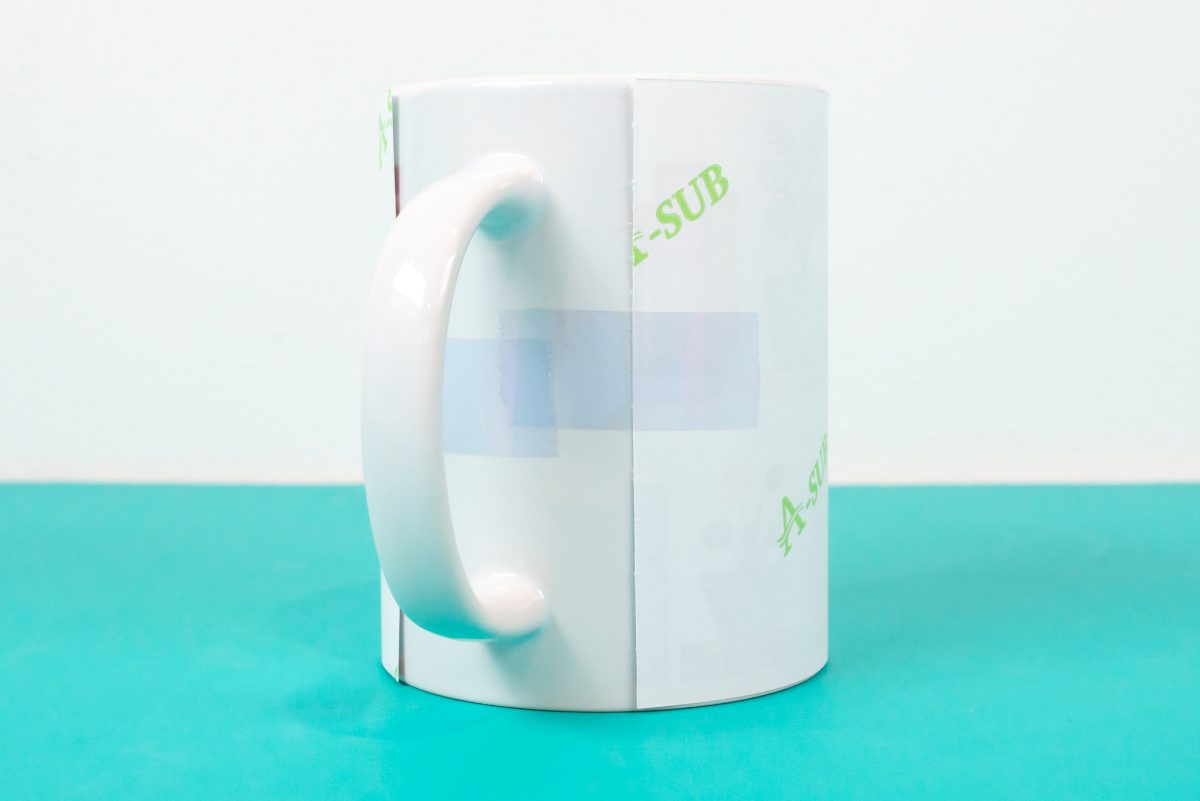 Mug with transfer taped to it