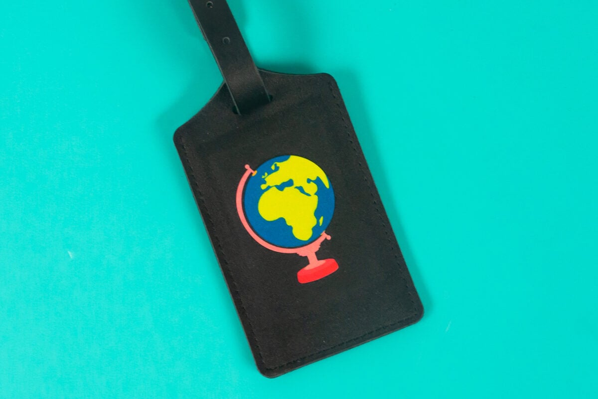 Black leather luggage tag with DTF globe