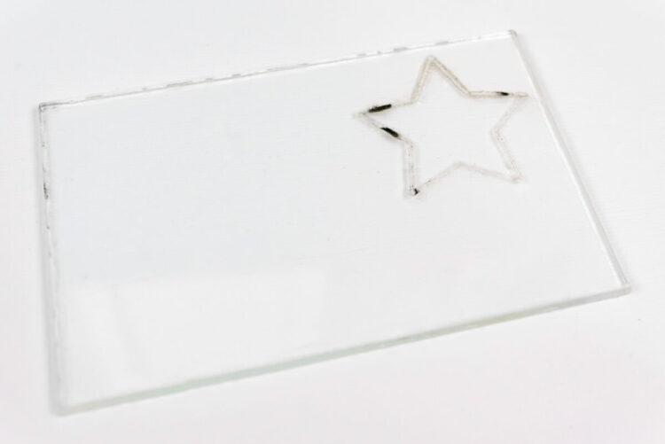 Clear acrylic with melted star cutout