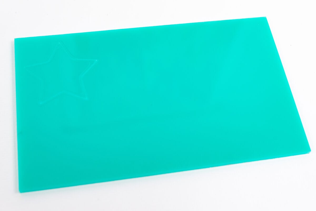teal acrylic with melted star cutout