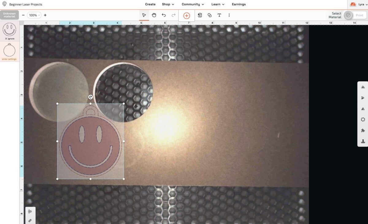 Glowforge App: showing placement of happy face keychain