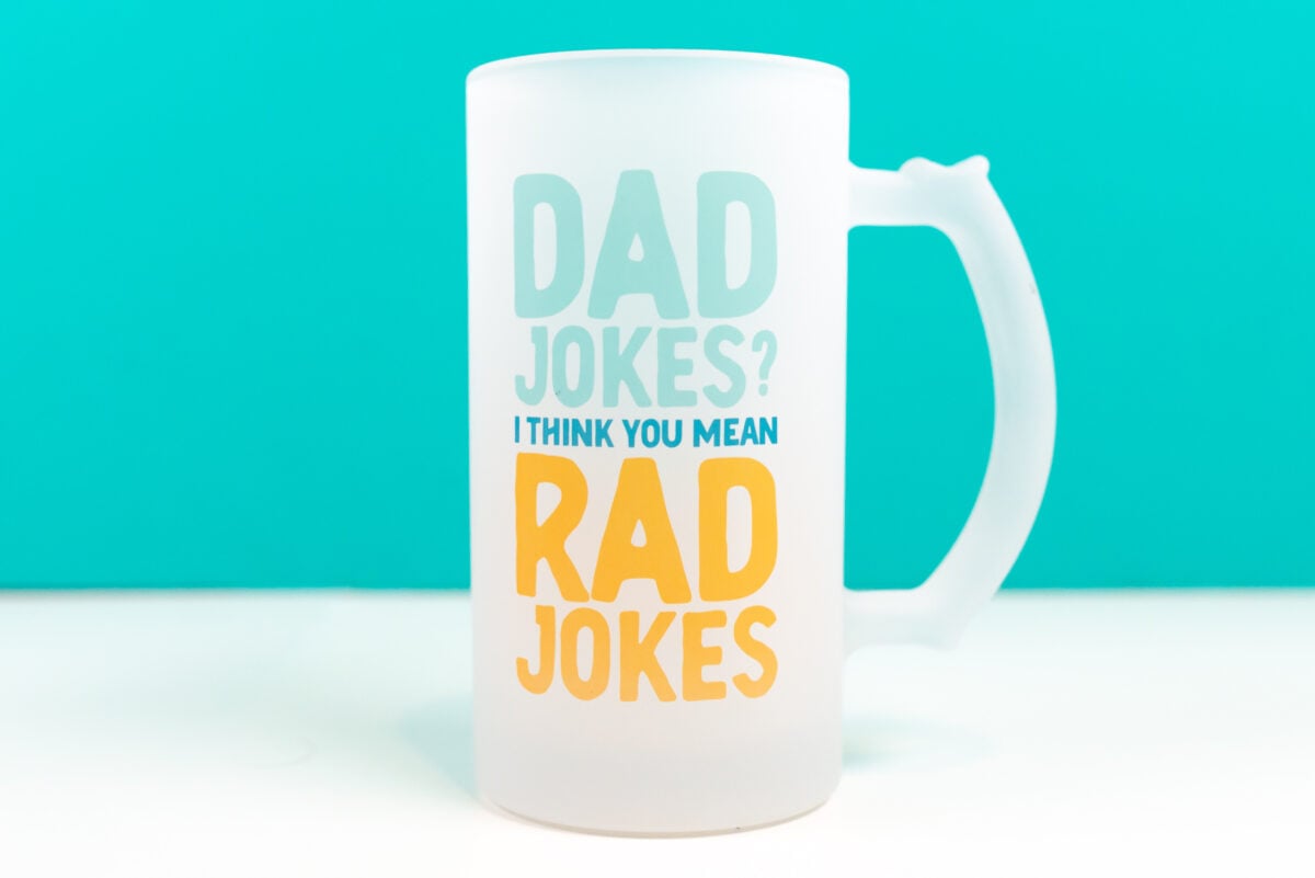 Mug with colorful "dad jokes? I think you mean rad jokes" image on it.