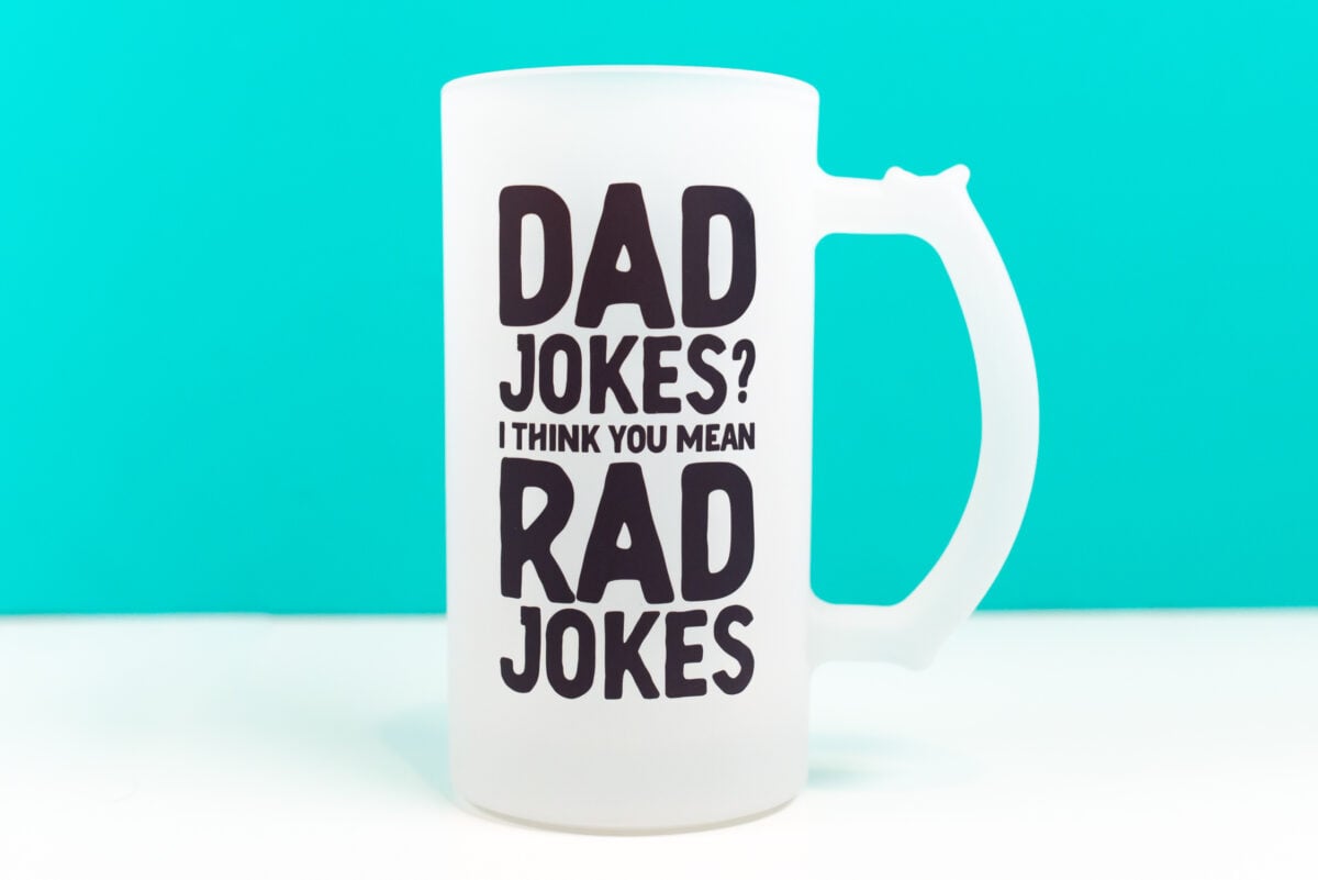 Mug with black "dad jokes? I think you mean rad jokes" image on it.