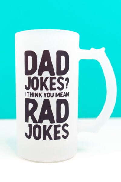 Mug with black "dad jokes? I think you mean rad jokes" image on it.
