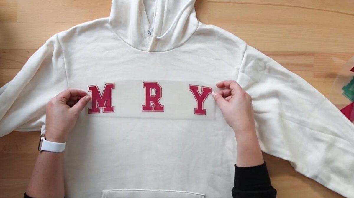 Placing word "Merry" on hoodie