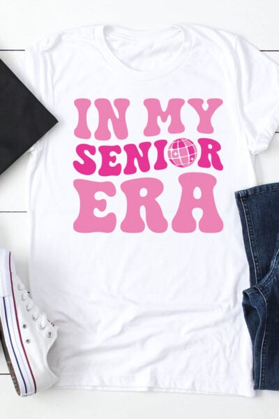 In My Senior Era SVG on a white shirt with a grad cap