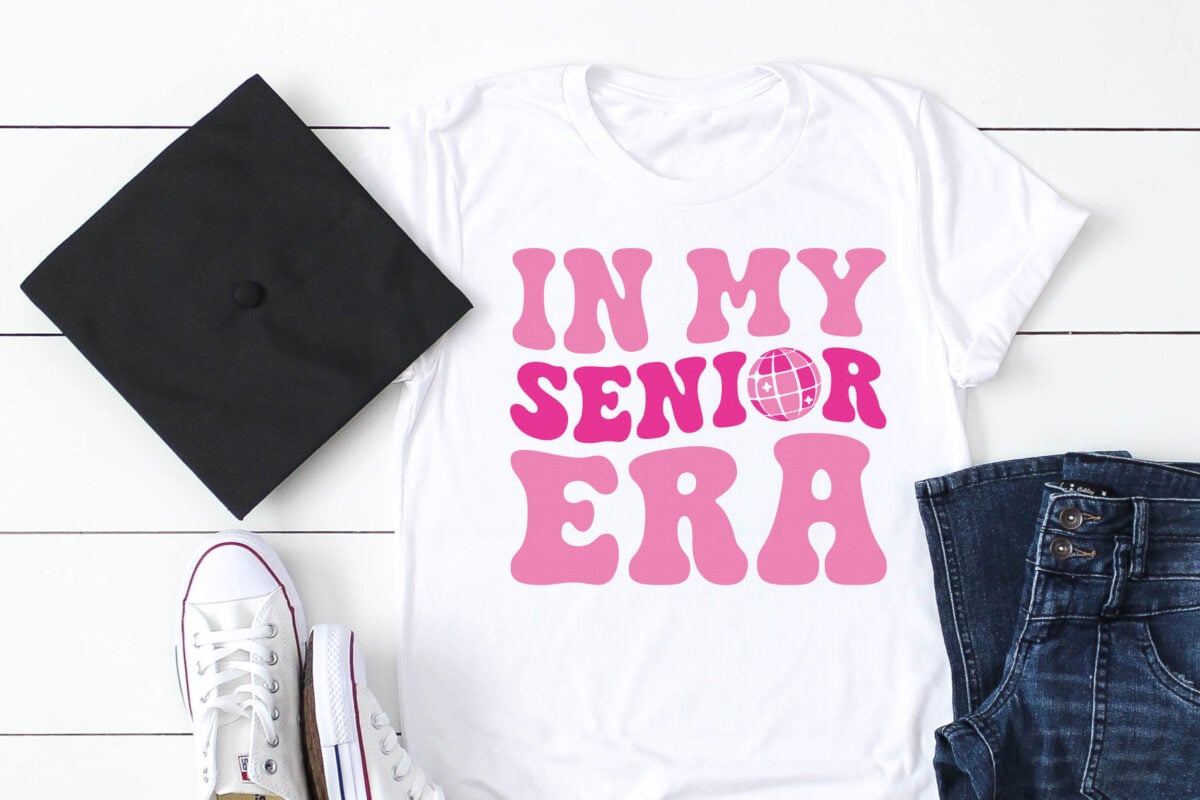 In My Senior Era SVG on a white shirt with a grad cap