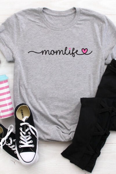 Mom Life SVG on a gray shirt with black pants